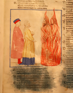 Dante et Virgile rencontrent Ulysse et Diomède. Virgile, en jaune, se fait l’interprète de Dante, qui porte un chapeau. (Miniature du XIVe siècle. Source : Wikimedia). 